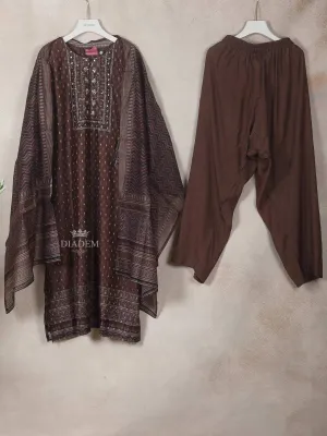 Dark Brown Georgette Straight-Cut Salwar Suit Adorned with Floral Design, Paired with Dupatta