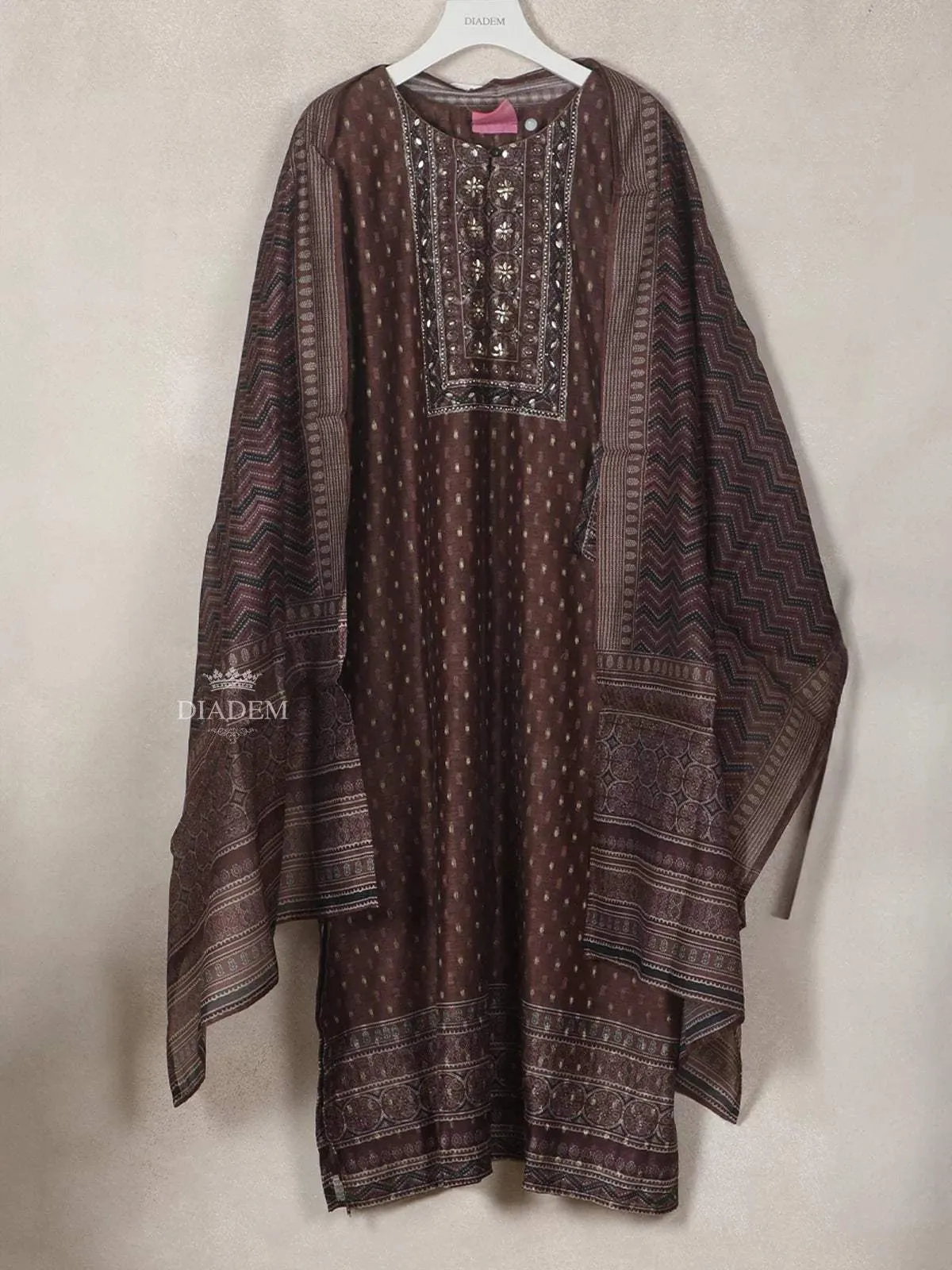 Dark Brown Georgette Straight-Cut Salwar Suit Adorned with Floral Design, Paired with Dupatta