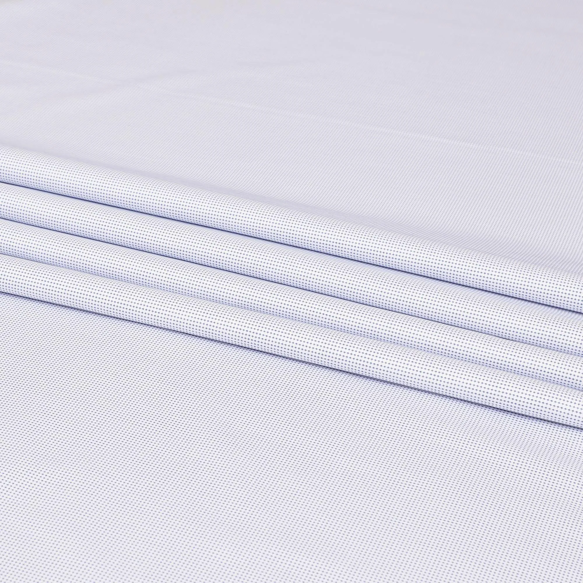 White 100%  cotton shirting fabric with blue dots in self design-D7409