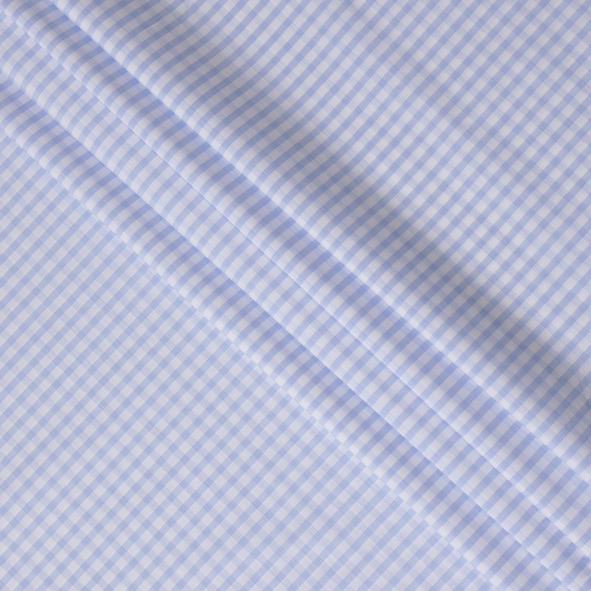 White Premium 100% cotton shirting fabric with turquoise baby blue print in checks design-D16844