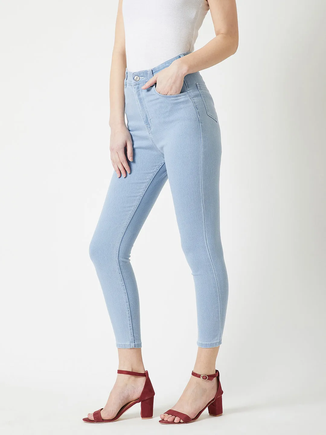 Women's Light Blue Skinny Fringed Hemline Detailing High Rise Ice Wash Clean Look Cropped Solid Stretchable Denim Jeans